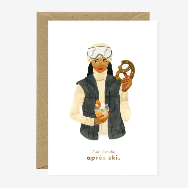 Illustrated Christmas greeting card with a depiction of a person wearing ski gear and holding a donut, with gold foil details and a blank interior for a personal message.