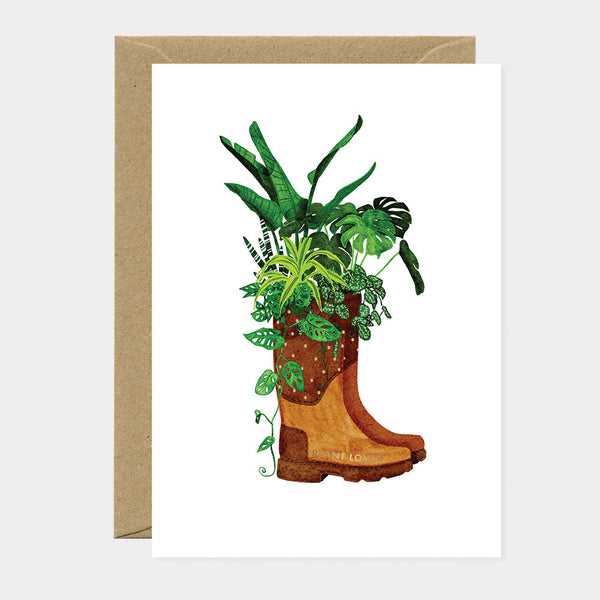 Greeting card with an illustration of a boot filled with lush green plants, symbolizing creativity, gardening, and love of nature.