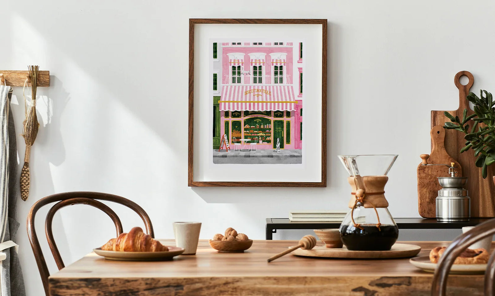 All the Ways to Say home decor – framed pink storefront art print in a cozy dining room setting