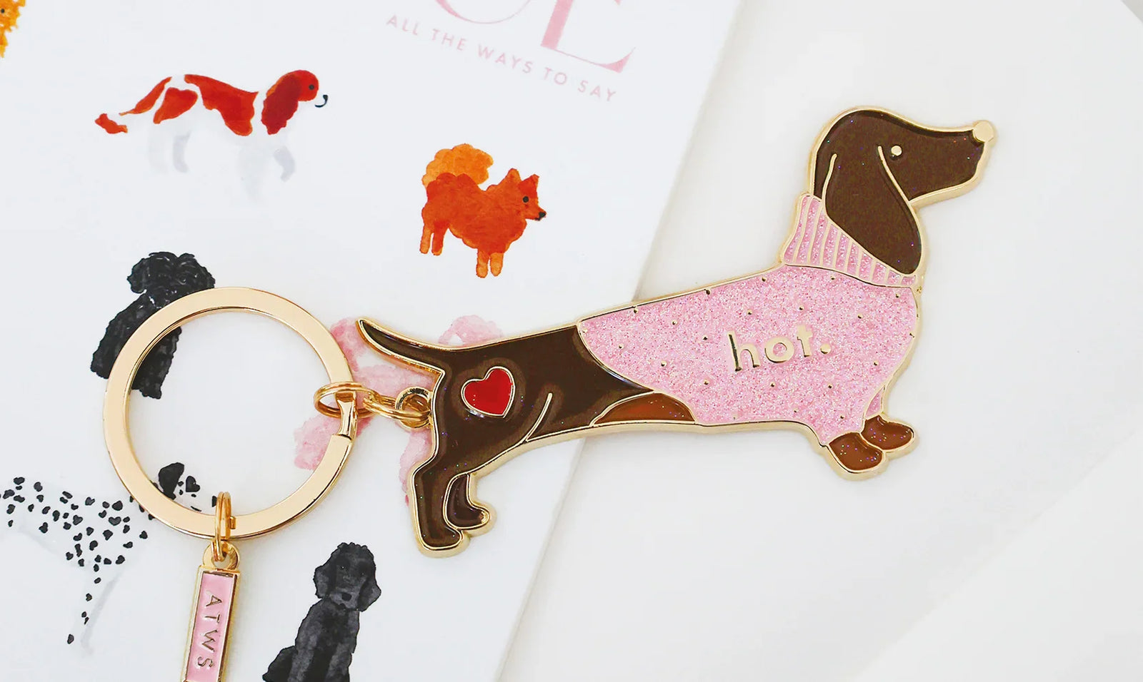 All the Ways to Say keychains – dachshund enamel keychain with pink glitter sweater and gold details