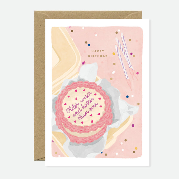 Birthday card with a pink cake illustration and text on a white background
