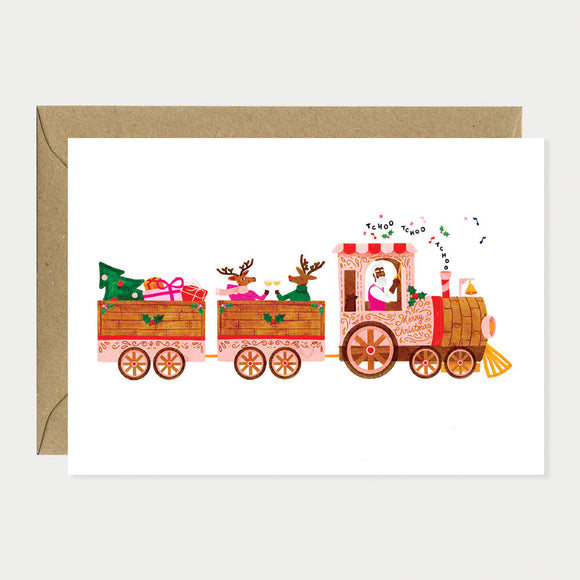Greeting card featuring a festive Christmas train carrying reindeer, gifts, and a decorated tree, symbolizing holiday cheer and celebration.