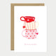 Greeting card with three stacked cups in red and pink, decorated with hearts and stripes, with the words "You’re my cup of tea".