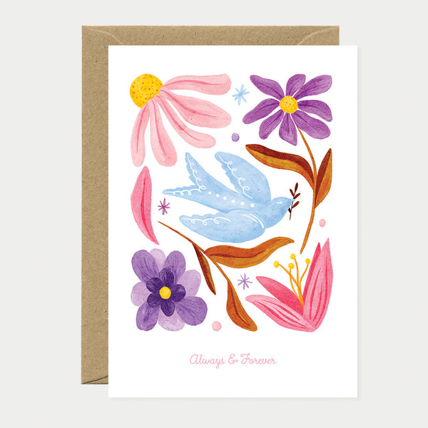Greeting card with a blue dove holding an olive branch, surrounded by pink and purple flowers, with the text "Always & Forever".