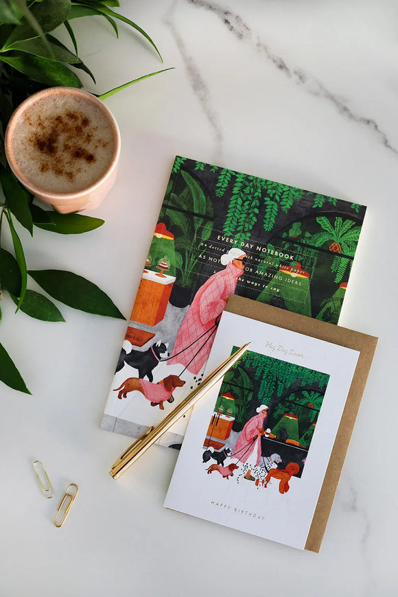 Hey Dog Lover birthday card with illustration of woman walking dogs, paired with matching notebook — artistic stationery by All the Ways to Say.