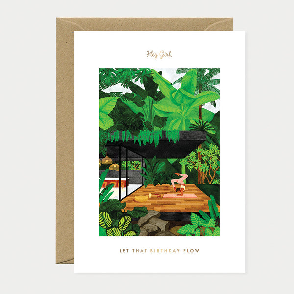 Greeting card with a tropical garden scene, showing a woman practicing yoga on a wooden deck, surrounded by lush greenery, symbolizing calm and flow.