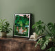 Tennis Court art print framed on a dark wooden cabinet surrounded by tropical green plants