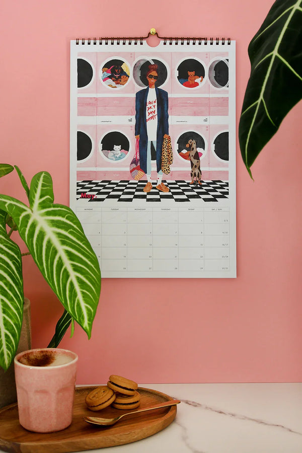 May page illustration from Daily Poetry 2026 calendar by All The Ways To Say – laundromat scene