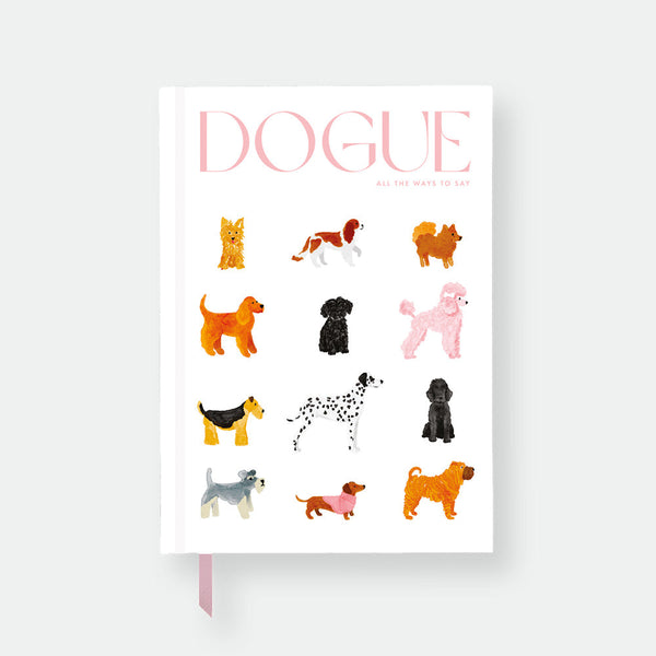 Hardcover notebook A5 with white cover, colorful dog breed illustrations, gold foil “Dogue” title and pink ribbon bookmark by All the Ways to Say.