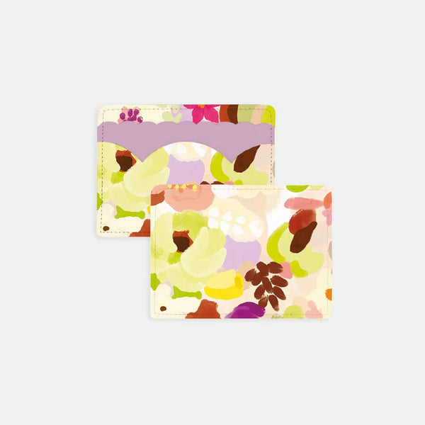 Front and back view of the Spring Sweets card holder featuring a hand-painted floral pattern in lilac, yellow, and blush with a scalloped pocket detail.