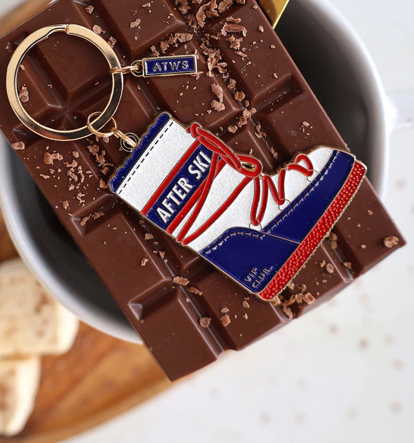 Detail of After Ski keychain with ATWS tag – winter enamel accessory