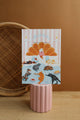 Home Sweet Home illustrated notebook by All The Ways To Say – pastel pink and orange design with sleeping pets and books