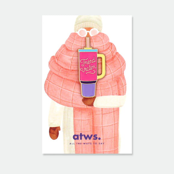 Trend Victim enamel pin by All the Ways to Say featuring pink and purple tumbler design with gold-plated details on fashion illustration background.