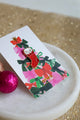 Cat Sock enamel pin on colorful Christmas card by All The Ways To Say – festive flatlay with pink and gold ornaments