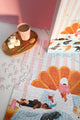 Home Sweet Home jigsaw puzzle in progress on table – warm coffee cup and marshmallows beside