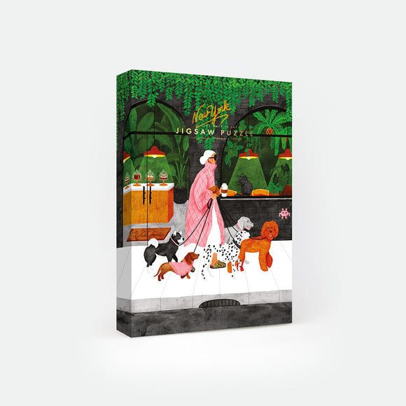 Dog Sitter jigsaw puzzle by All the Ways to Say – stylish woman walking six dogs in a lush green city street with coffee cup in hand.