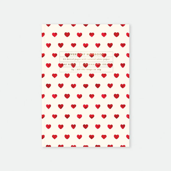 A5 notebook cover by All The Ways To Say featuring a repetitive pattern of small red watercolor hearts on a cream background.