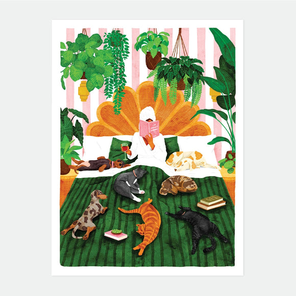 A cozy watercolor poster by All The Ways To Say showing a person reading in bed surrounded by many dogs, cats, and lush hanging plants.