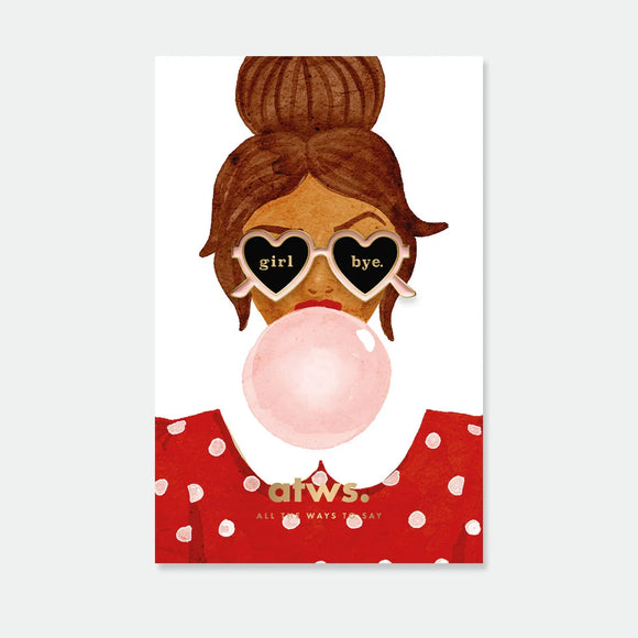 A trendy gold enamel pin by All The Ways To Say shaped like pink heart sunglasses with "girl bye" text, displayed on an illustration of a woman blowing bubblegum.