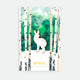 Bébé biche enamel pin by All the Ways to Say featuring gold-plated deer design on illustrated green forest background with birch trees and mountains.