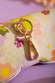 Spring Sweets Clip Case - Detail of the gold-tone metal clip for easy attachment to bags.