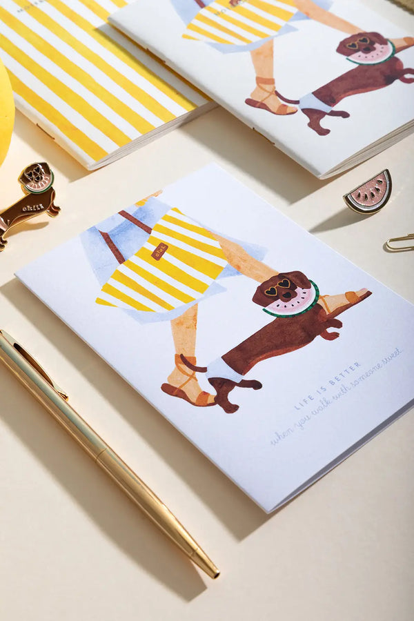 Summer Dachshund - Collection: close-up of a notebook illustration showing a dachshund wearing a watermelon slice as sunglasses.
