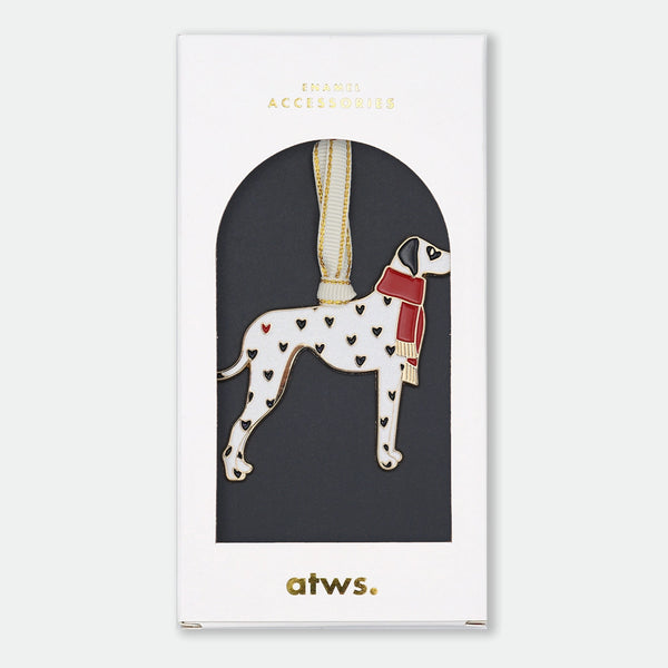 Gold-tone enamel Christmas ornament of a Dalmatian wearing a red scarf, with black heart-shaped spots and one red heart, on a gold-trimmed ribbon