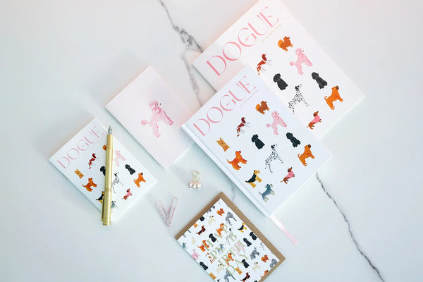 Detail view of Dogue notebook cover with pink dog illustration