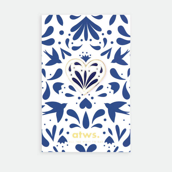 Blue Heart enamel pin by All the Ways to Say featuring gold-plated blue and white heart design on illustrated floral pattern background with swallows.