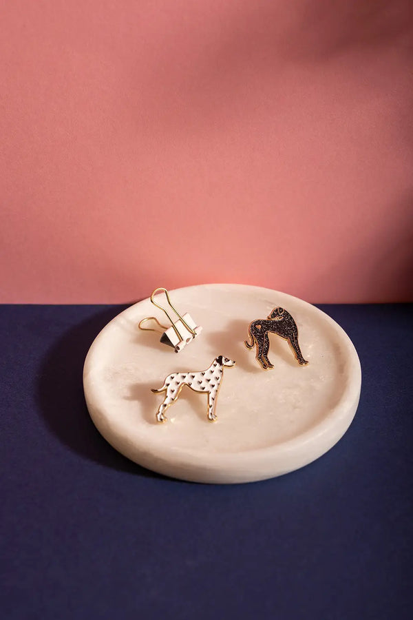 Greyhound - Pins: stylish dog-themed enamel pins displayed against a pink and navy blue background.