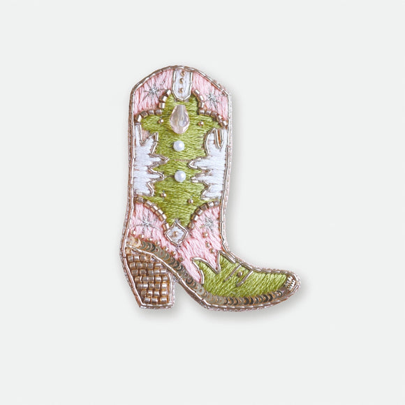 Hand-embroidered cowboy boot brooch (Santiag) with pink and green threads, sequins, and gold cannetille wire.
