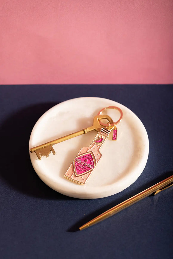 Spicy & Hot Keychain - Pink hot sauce bottle illustration on a marble tray with a vintage key.