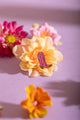 Pink Santiag - Pins: western-style pink glitter boot pin creatively placed inside a peach-colored flower.