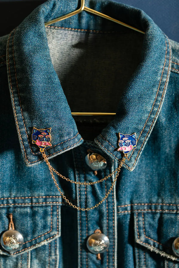 Duo Tiger Chain - Pins: mystical blue tiger enamel pins with gold chains on a dark denim jacket.