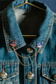 Duo Tiger Chain - Pins: mystical blue tiger enamel pins with gold chains on a dark denim jacket.